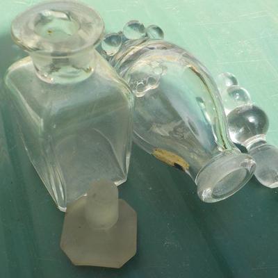 Vintage glass holders with unusual special design.