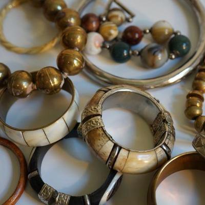 #6- 11  Grouping of Ethnic style costume jewelry Brass , silver and agate. 