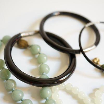 #6-13  Grouping of Jade bead necklaces and black lacquer and silver bracelets
