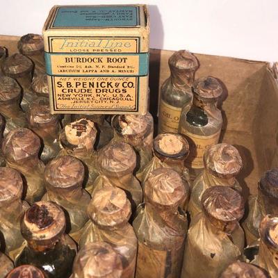 Lot #59: Collection of Liquid Wrapped Medicine Bottles
