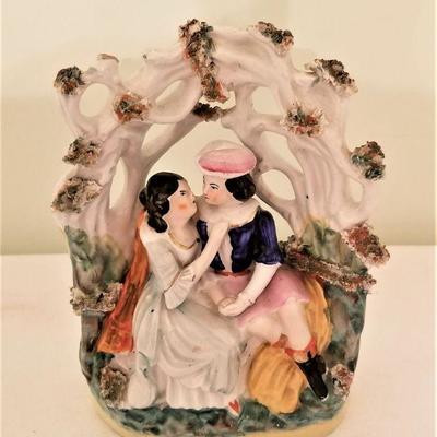 Lot #52  Antique Staffordshire figure - two lovers