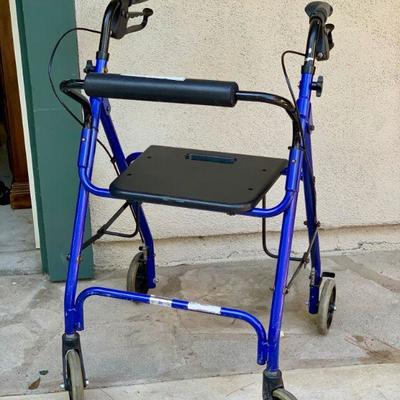 LOT 49  HEALTH/MOBILITY  BLUE FRAME WALKER WITH SEAT