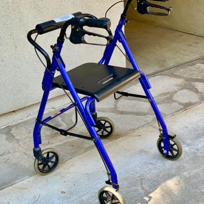 LOT 49  HEALTH/MOBILITY  BLUE FRAME WALKER WITH SEAT