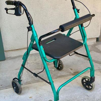 LOT 50  HEALTH/ MOBILITY/ MEDICAL TURQUOISE WALKER WITH SEAT
