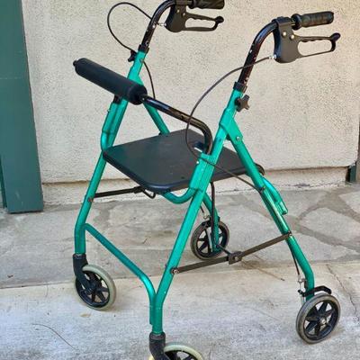 LOT 50  HEALTH/ MOBILITY/ MEDICAL TURQUOISE WALKER WITH SEAT