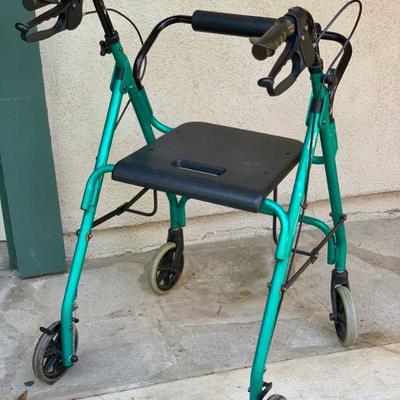 LOT 50  HEALTH/ MOBILITY/ MEDICAL TURQUOISE WALKER WITH SEAT
