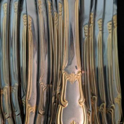 Lot 204 - Two Tone Stainless Silver and Gold Flatware - 60 pieces 