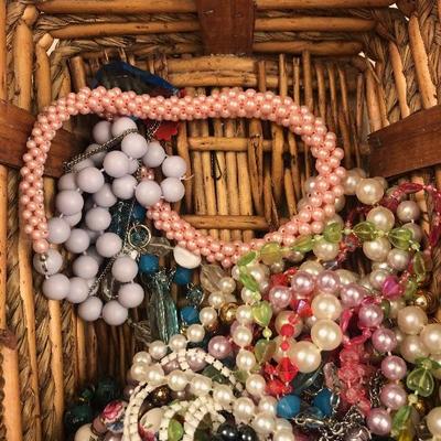 #180 Basket of used costume jewelry
