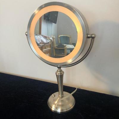 #185 Lighted, magnifying vanity mirror