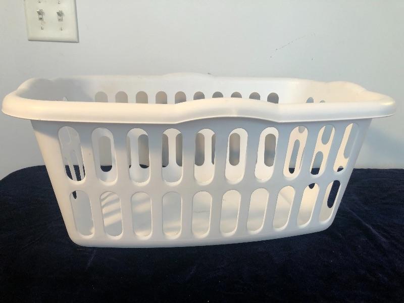 #194 Standard size white laundry basket  EstateSales.org