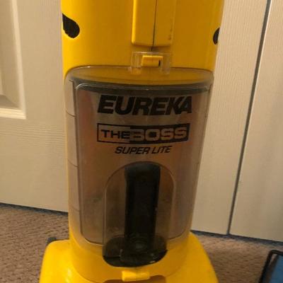 #202 Small upright Eureka Vacuum and Carpet sweeper