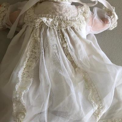 #272  Baby doll dressed in white gown