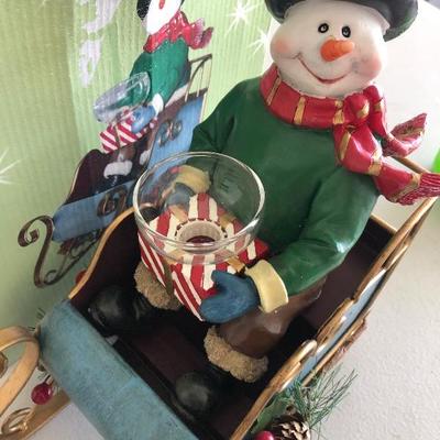 #275 Ceramic Frosty with sled candle holder