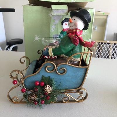 #275 Ceramic Frosty with sled candle holder