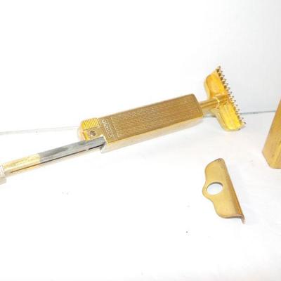 Schicks Slim gold single razon .