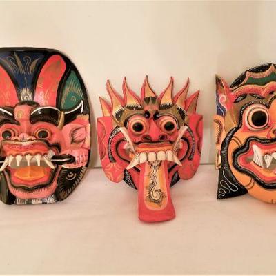 Lot #102  Lot of Three Colored Masks - travel souvenirs