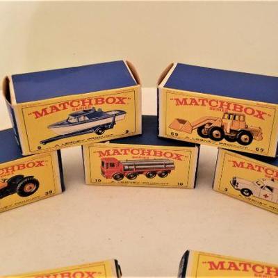 Lot #106  Lot of vintage Matchbox Cars in the original boxes, plus 2 extras.  
