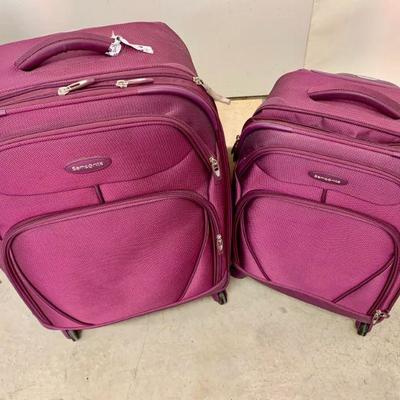 LOT 131  PAIR OF SAMSONITE ROLLER  BAGS 