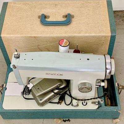 LOT 130  VINTAGE WHITE SEWING MACHINE IN CASE 