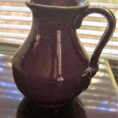 Burgundy ceramic water pitcher