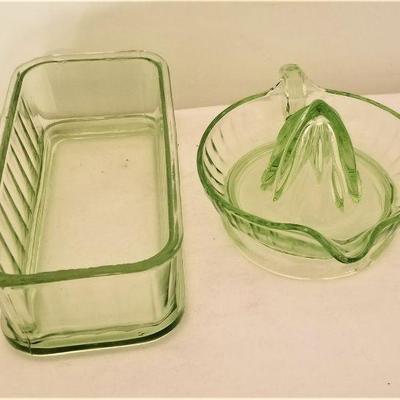Lot #125  Two Piece Vaseline Glass Lot - Reamer and Refrigerator Dish (bottom)