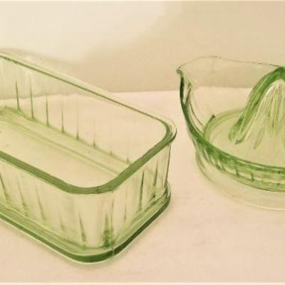 Lot #125  Two Piece Vaseline Glass Lot - Reamer and Refrigerator Dish (bottom)