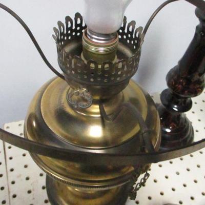 Lot 97 - Brass Lamp & Candle Holders