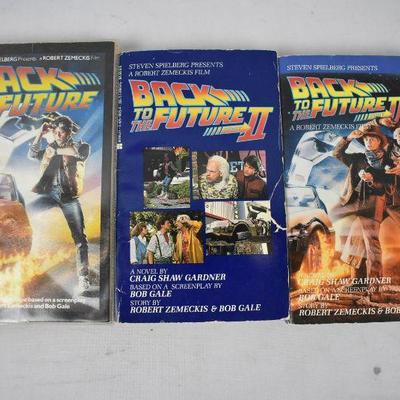 Back to the Future Lot: Books Part 1, 2, and 3; VHS Parts 1 and 3