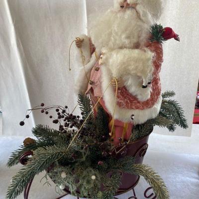 Lot # 597 Christmas Santa on Sled in Pink Suit 