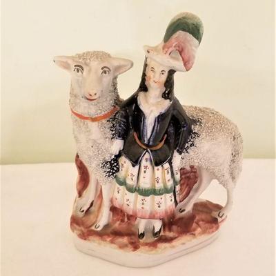 Lot #152  Antique 19th Century Staffordshire figure of woman with sheep