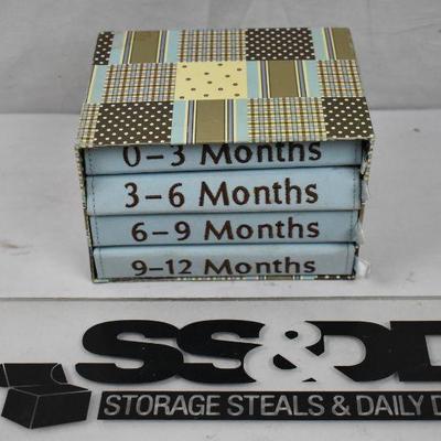 4 Small Photo Albums for Baby's First Year. Blue/Brown/Yellow