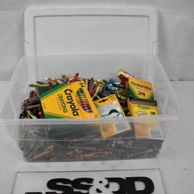 Clear Bin of Crayons & Crayon Sharpener