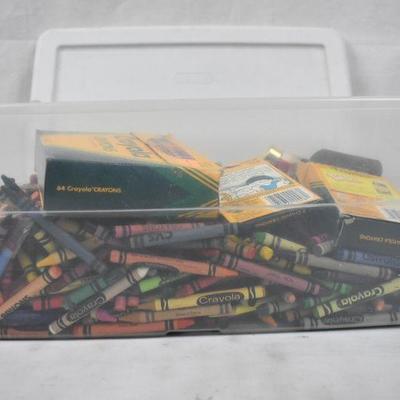 Clear Bin of Crayons & Crayon Sharpener