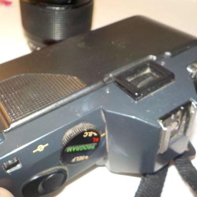 " Canon 35 mm. Camera T50 Programmed Auto with zoom lens"