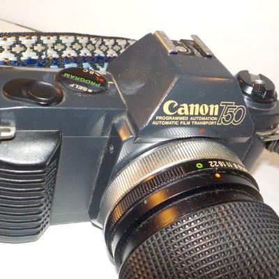 " Canon 35 mm. Camera T50 Programmed Auto with zoom lens"