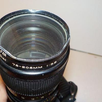 " Canon 35 mm. Camera T50 Programmed Auto with zoom lens"