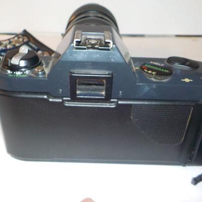 " Canon 35 mm. Camera T50 Programmed Auto with zoom lens"