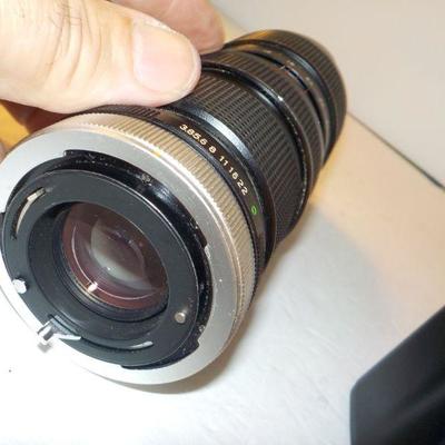 " Canon 35 mm. Camera T50 Programmed Auto with zoom lens"