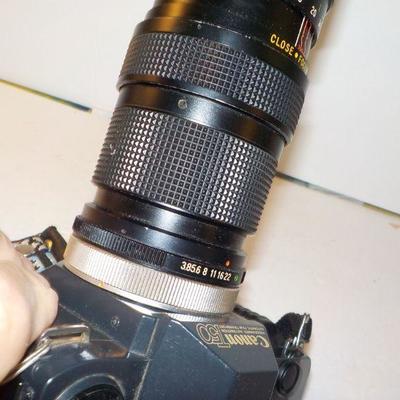 " Canon 35 mm. Camera T50 Programmed Auto with zoom lens"