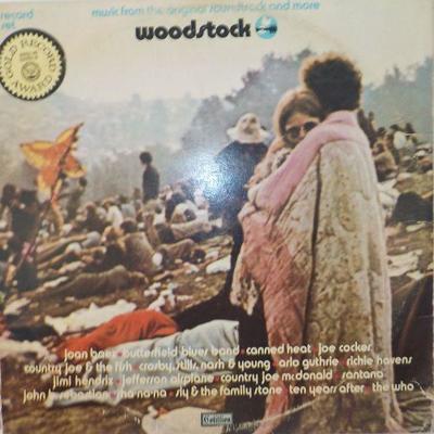 Original "Woodstock" -3 record LP and cover .