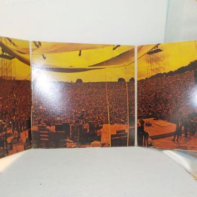 Original "Woodstock" -3 record LP and cover .