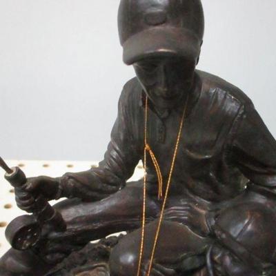 Lot 143 - Little Boy & Man Fishing Dezine Figure Statue