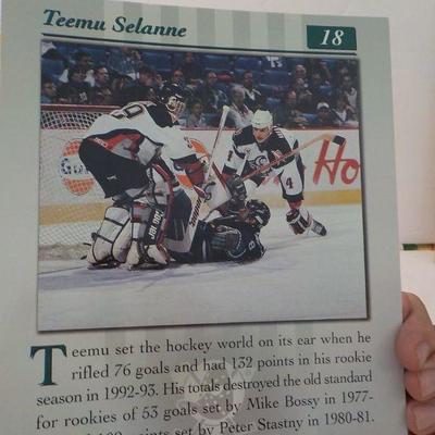 Donruss 97 Hockey hero's Teemu Selanne and Joe Sakie.
