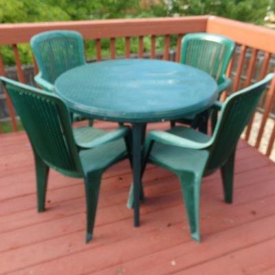LOT 67  TWO PLASTIC ROUND PATIO TABLES