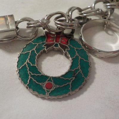 " Sterling Silver Charm Bracelet."