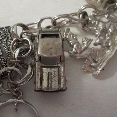 " Sterling Silver Charm Bracelet."