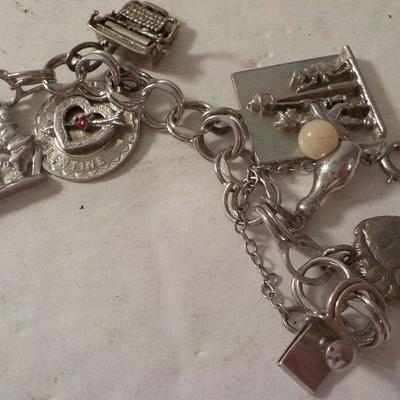 " Sterling Silver Charm Bracelet."