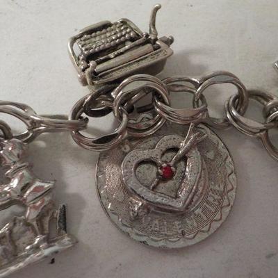 " Sterling Silver Charm Bracelet."