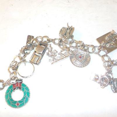 " Sterling Silver Charm Bracelet."