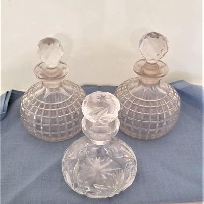 Lot #263  Lot of Three antique pressed glass scent bottles with glass stoppers
